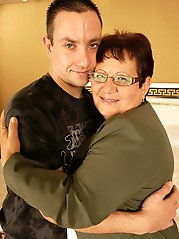 Horny mature slut playing with her toy boy