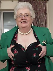 British granny playing with her voluptous body