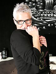 Horny mature lady getting herself wet