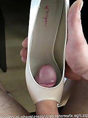 A village woman gets intimate with a vendor of bras.