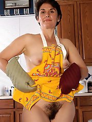 An aged prostitute is spreading her legs to make some money