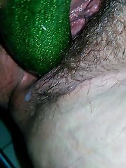 Smiling female puts on hot bra