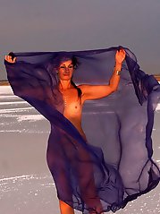 Beautiful sunset scenery by a shawl on a salt lake