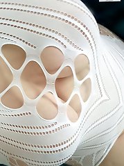 An older woman indulges in playful activities with her partner