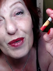 A stunning older woman wears seductive underwear