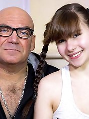 Long-legged mature housewife is fingering herself