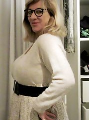 Her petticoat pressed her breasts forward